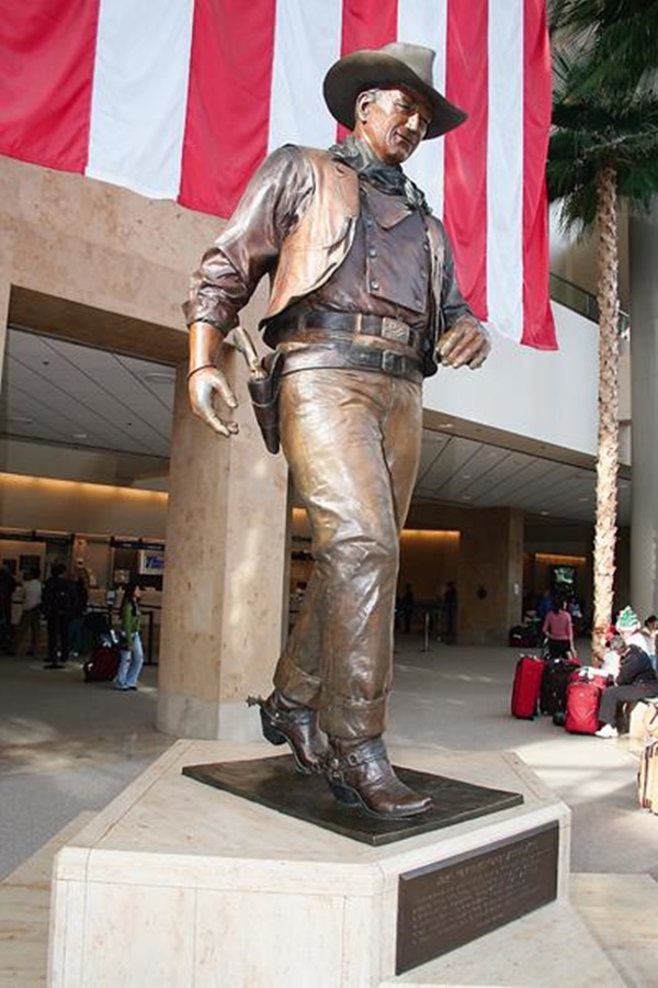 OC Democrats Demand John Wayne's Name + Statue Removed from Orange County Airport